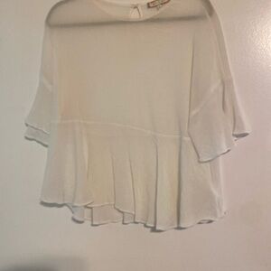White crepe flurry top